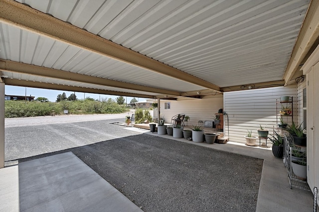 view of patio featuring a carport