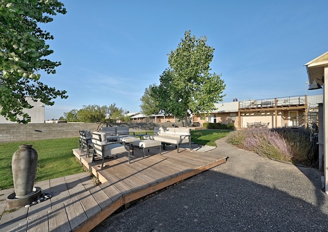 view of yard with an outdoor hangout area and a deck