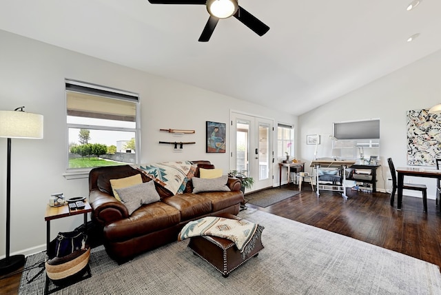 living room with hardwood / wood-style floors, french doors, plenty of natural light, and lofted ceiling