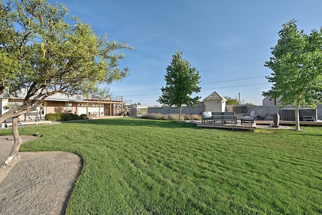 view of yard featuring a wooden deck