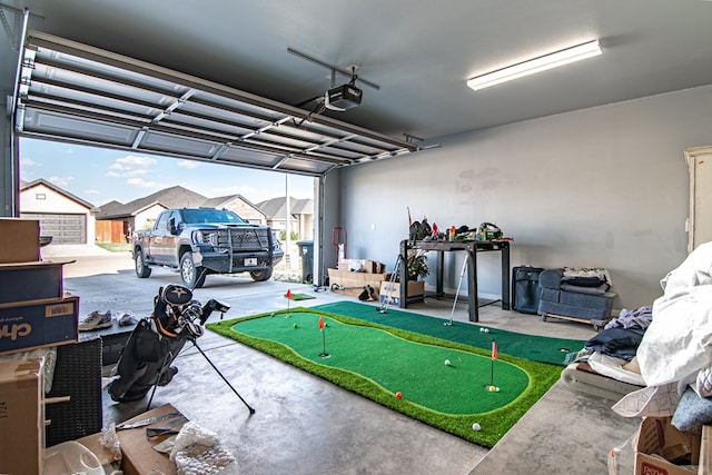 garage featuring a garage door opener