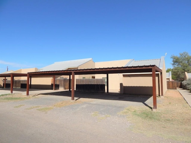 view of front of house with a carport