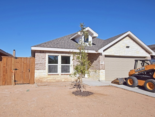 view of front of home featuring a garage