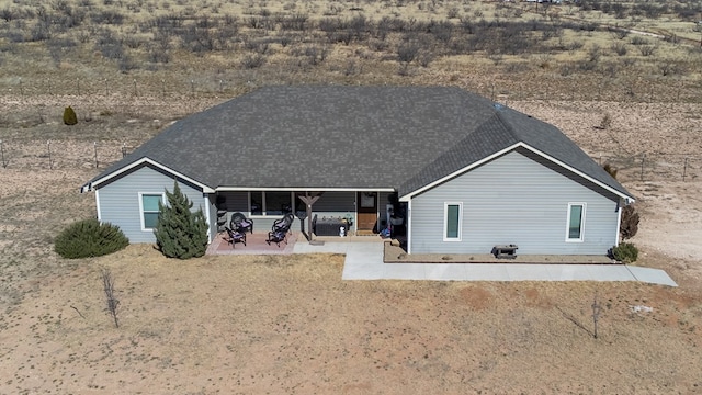 back of property featuring a patio area