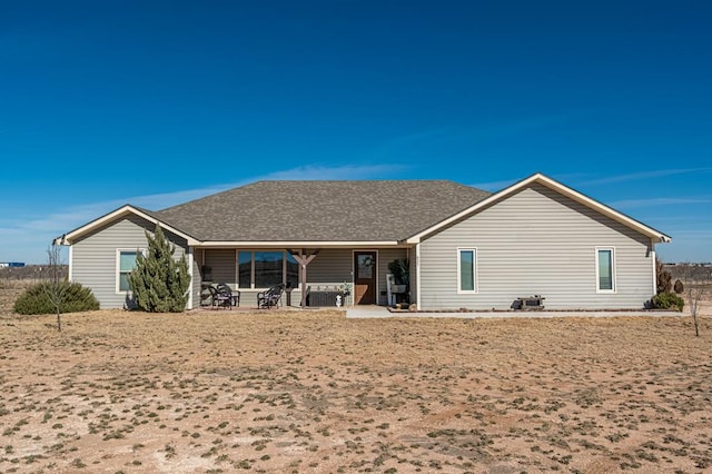 back of house with a patio area