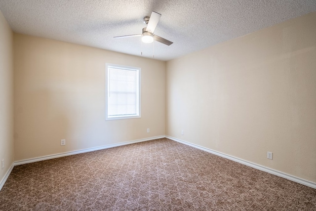 empty room with baseboards, a textured ceiling, ceiling fan, and carpet flooring