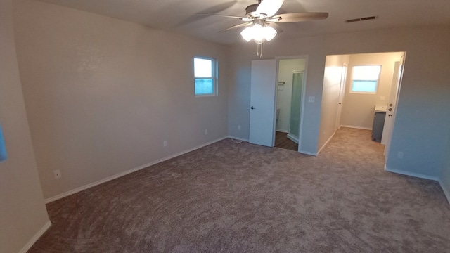 unfurnished bedroom featuring carpet flooring and ceiling fan