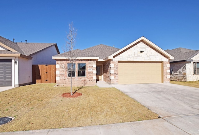 ranch-style home featuring a garage and a front yard