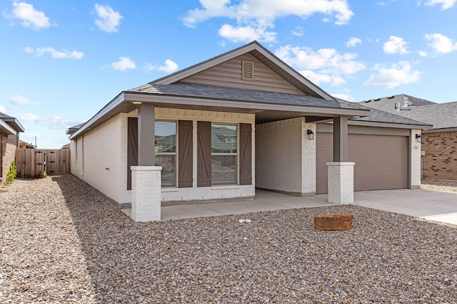 view of front of property featuring a garage