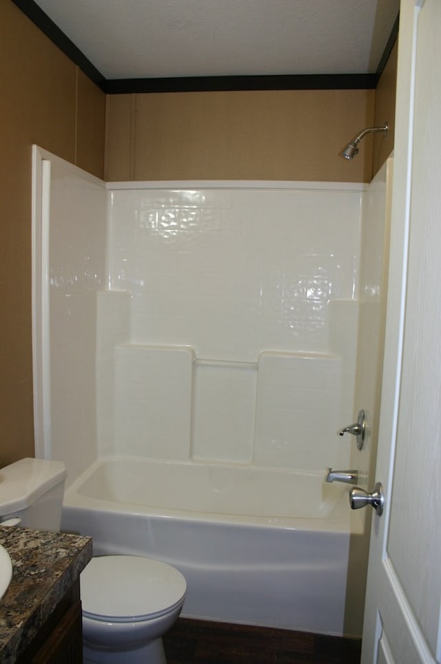 full bathroom featuring shower / tub combination, vanity, and toilet