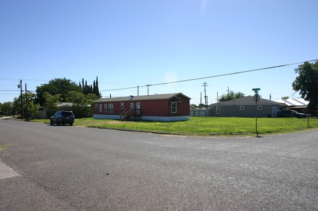 view of front of home with a front yard