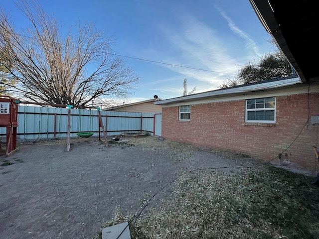 view of yard with fence