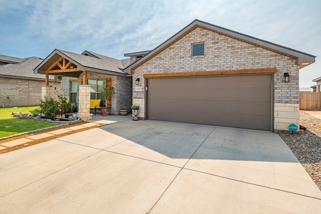 view of front of property featuring a garage