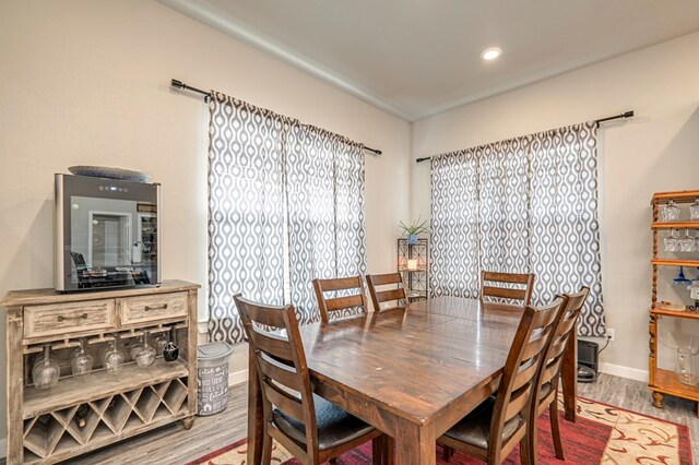 dining room with hardwood / wood-style floors