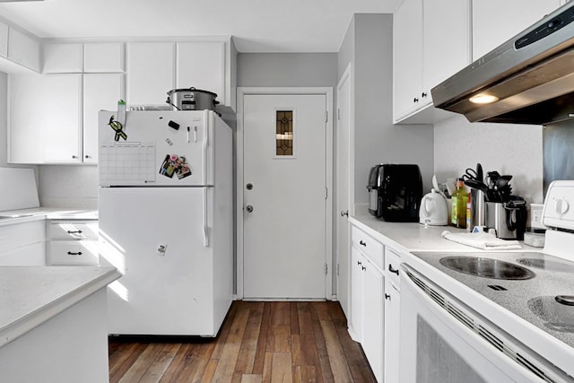 kitchen with white cabinetry, white appliances, and dark hardwood / wood-style flooring