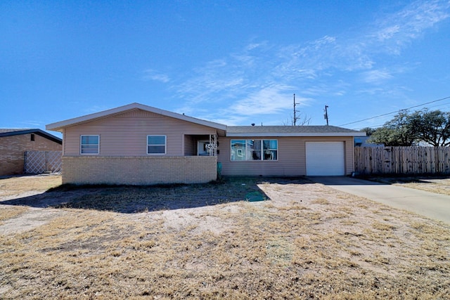 ranch-style home with a garage