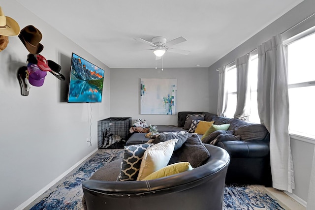 living room featuring ceiling fan