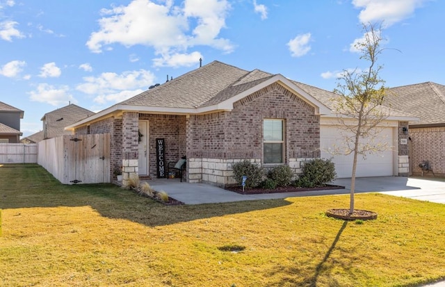 single story home featuring a garage and a front lawn