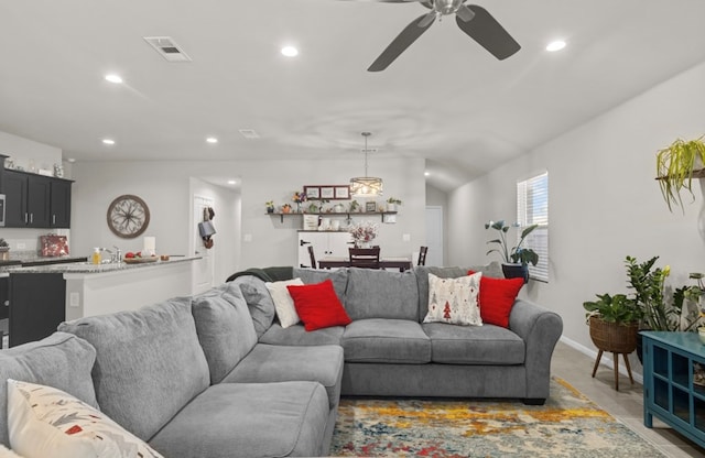 living room featuring ceiling fan