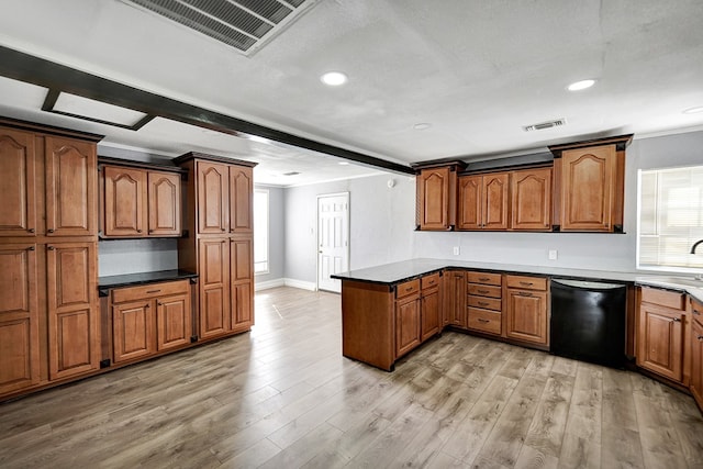 kitchen featuring ornamental molding, dishwasher, sink, and light hardwood / wood-style flooring