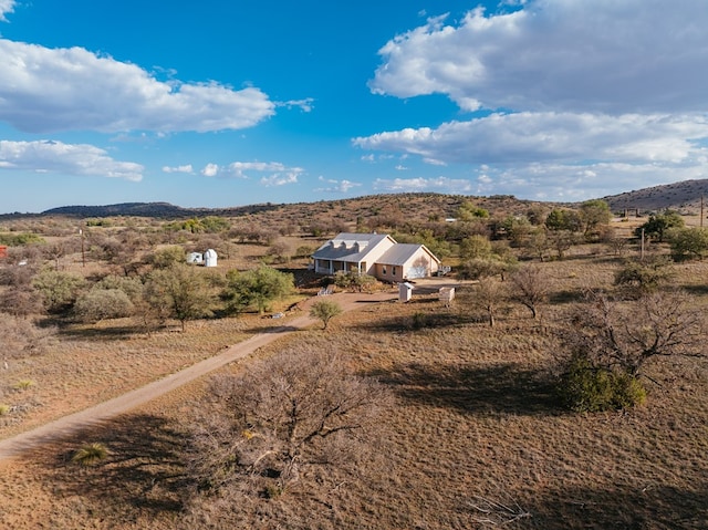 mountain view featuring a rural view