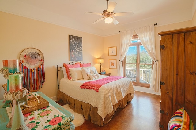 bedroom featuring ceiling fan and ornamental molding