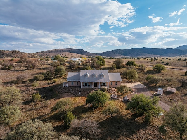 drone / aerial view featuring a mountain view