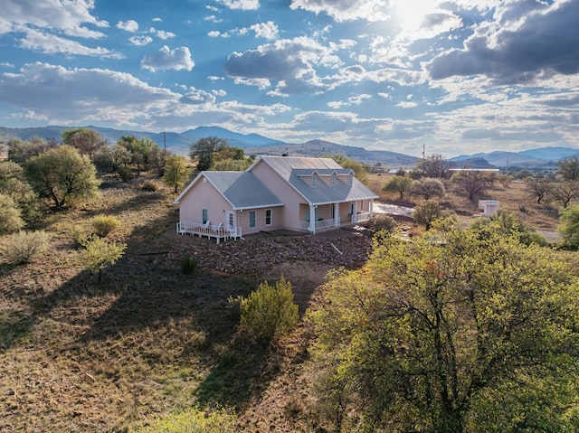 drone / aerial view featuring a mountain view