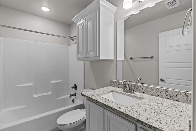 full bathroom featuring vanity, toilet, and tub / shower combination