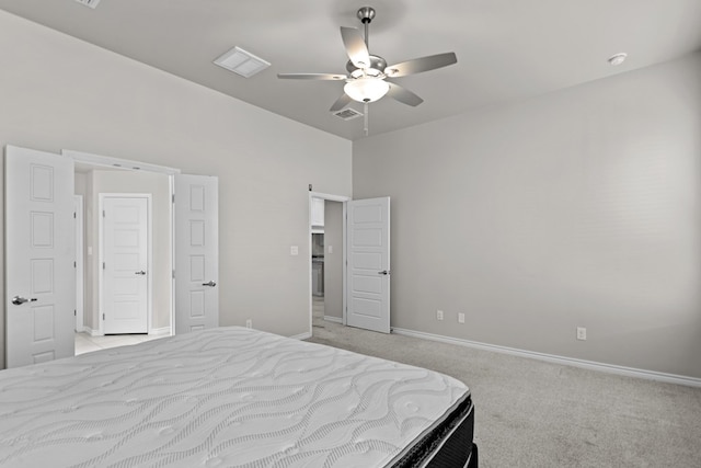 bedroom featuring ceiling fan and light carpet