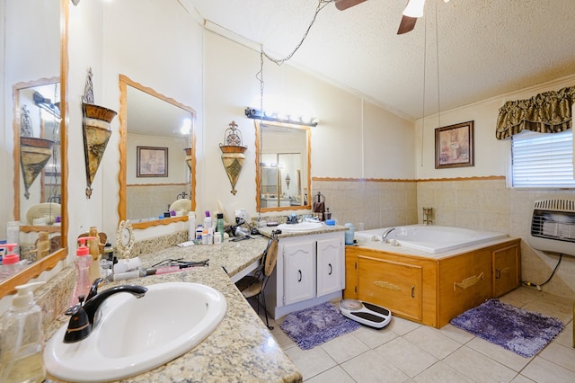 bathroom with tile patterned floors, ceiling fan, ornamental molding, a textured ceiling, and heating unit