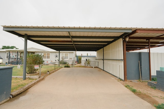 view of car parking featuring a carport