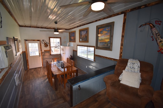 living room with dark hardwood / wood-style flooring, wooden ceiling, and ornamental molding