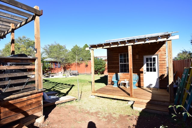 view of yard featuring a pergola and a deck