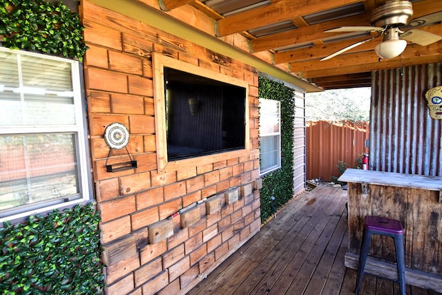 wooden terrace with ceiling fan