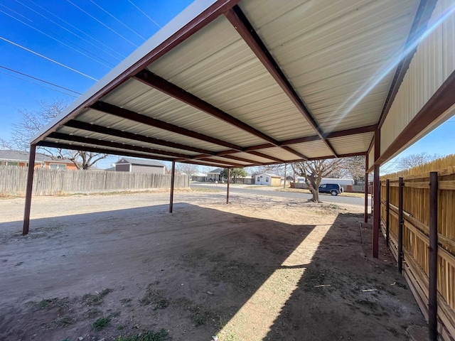 exterior space featuring a carport