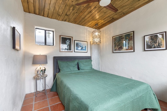 tiled bedroom with wooden ceiling and ceiling fan with notable chandelier