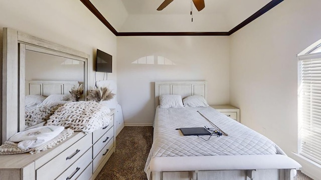 bedroom with dark colored carpet, ceiling fan, and crown molding