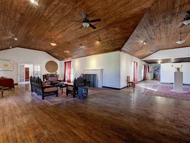 unfurnished living room featuring wooden ceiling, vaulted ceiling, and hardwood / wood-style flooring