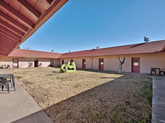 view of front of property featuring a patio