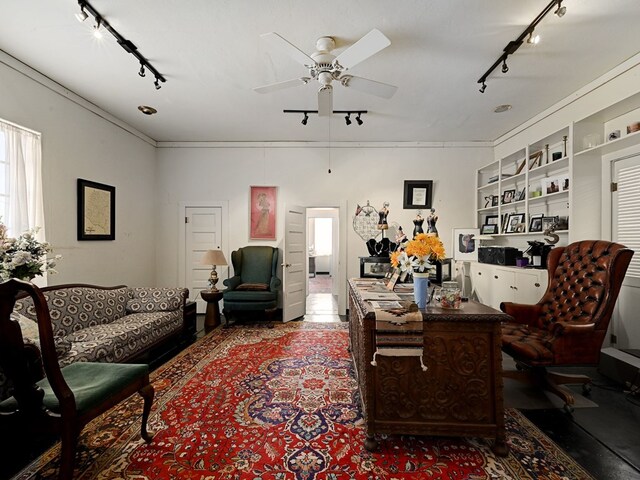 living room with track lighting, ceiling fan, and ornamental molding