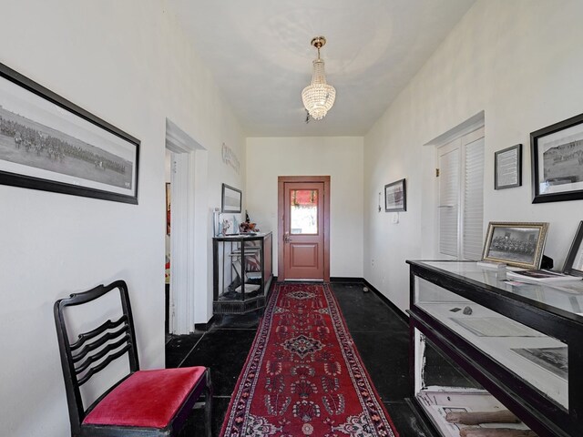 entrance foyer with an inviting chandelier