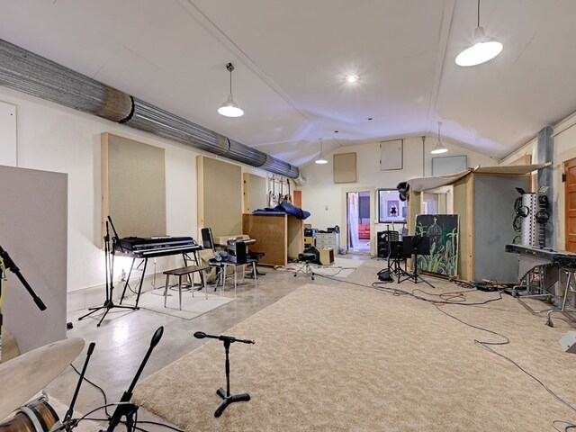 exercise area with lofted ceiling