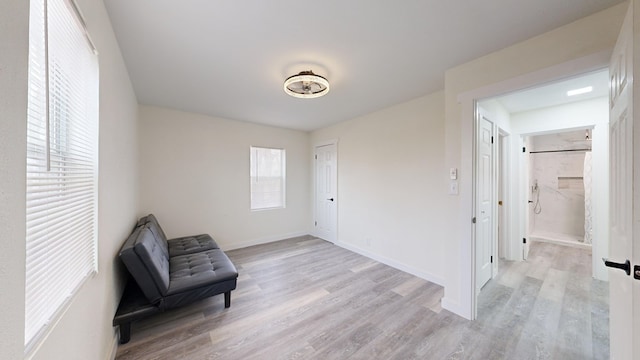 sitting room with light wood-type flooring