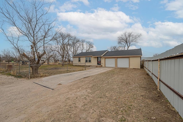 view of front of property featuring a garage