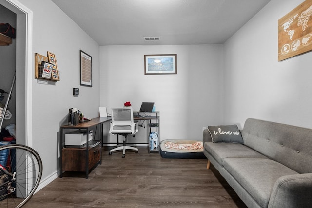 office space featuring dark wood-type flooring