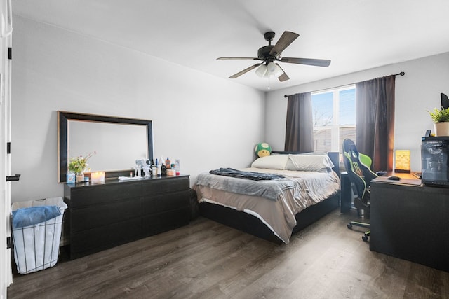 bedroom featuring dark hardwood / wood-style floors and ceiling fan