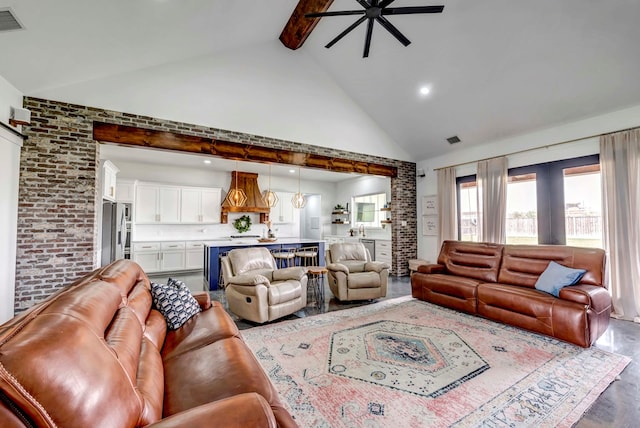 living room featuring ceiling fan, hardwood / wood-style flooring, high vaulted ceiling, and beamed ceiling