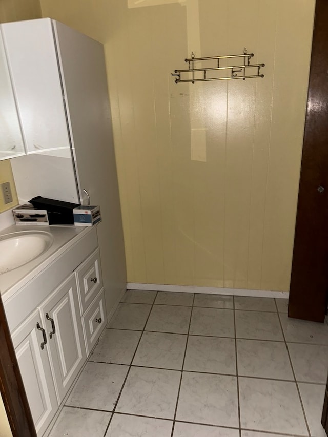 bathroom featuring tile patterned floors and vanity