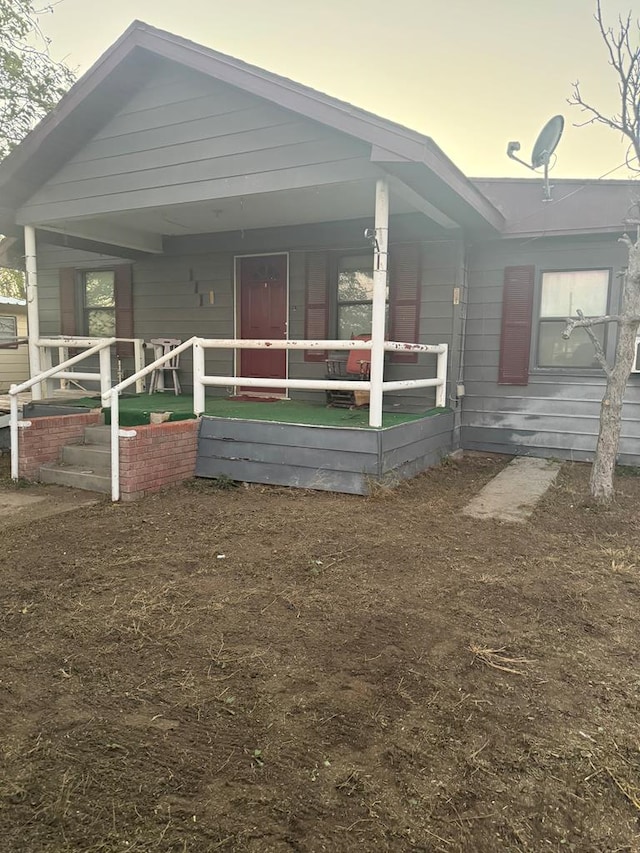 view of front of house with covered porch